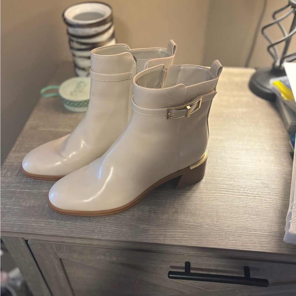 Calvin Klein Cream Ankle Booties with Metallic Buckle